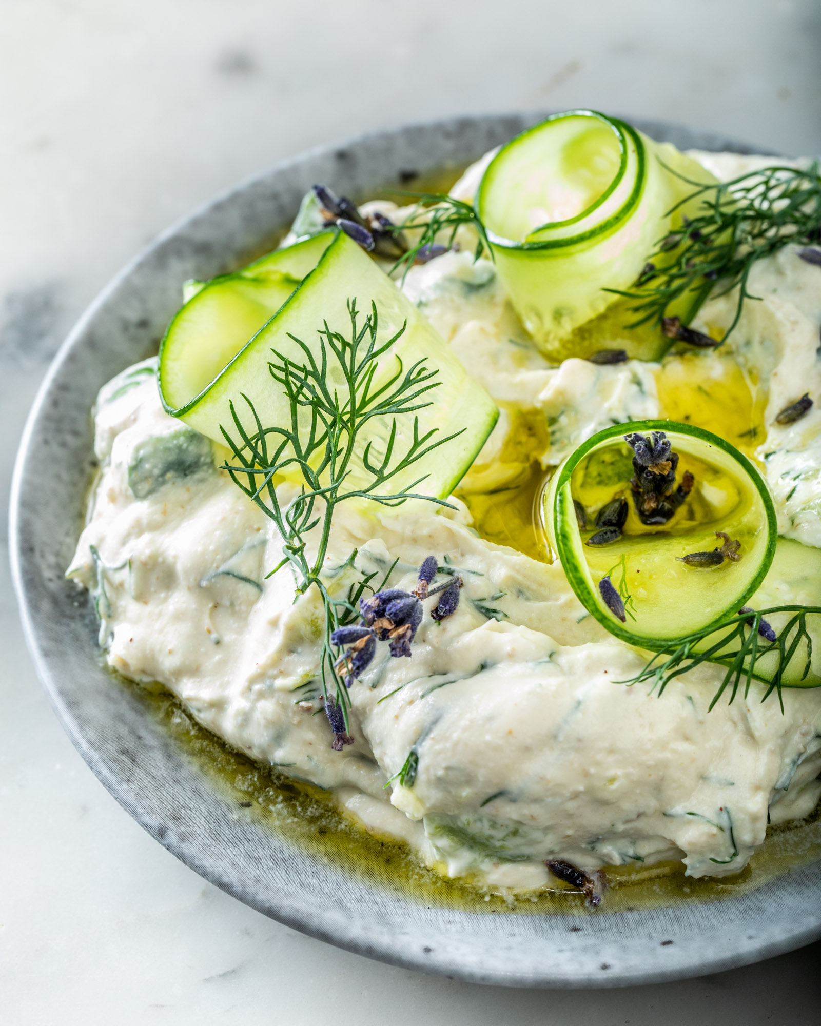 A perfectly arranged plate of tzatziki by Chef Ayesha Rae.