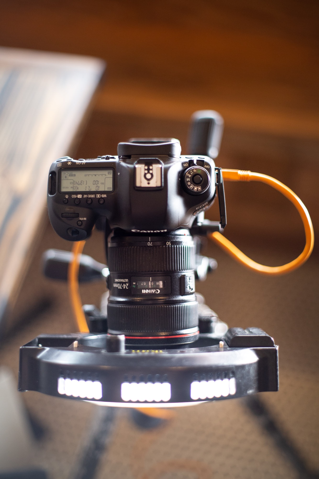 a canon 5d with a ring light attached for food photography