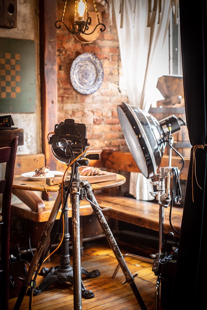 Behind the scenes view of a culinary food photography shoot