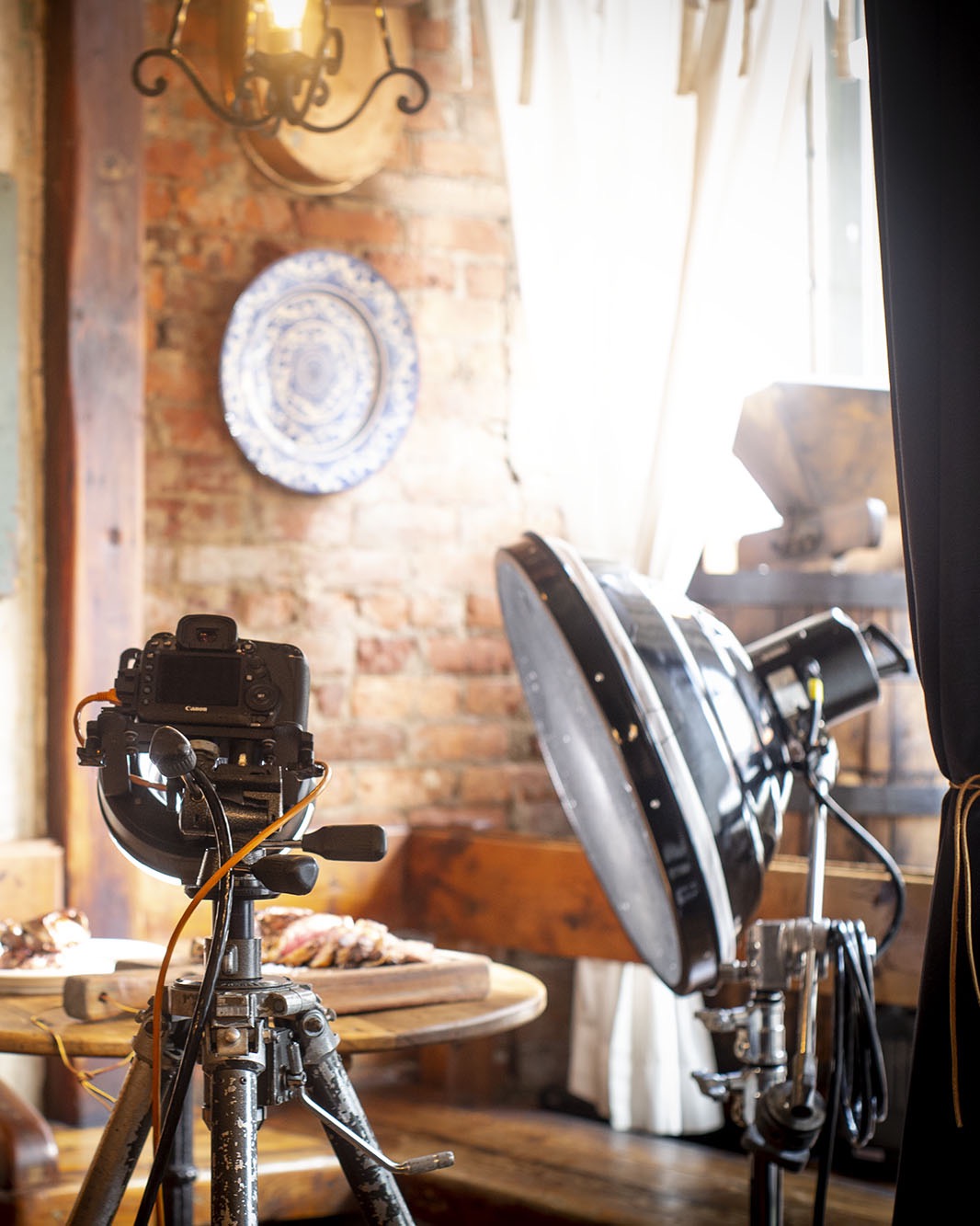 Italian food being photographed in a rustic Italian setting