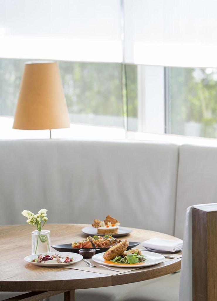 Table of food at the restaurant Perry Street