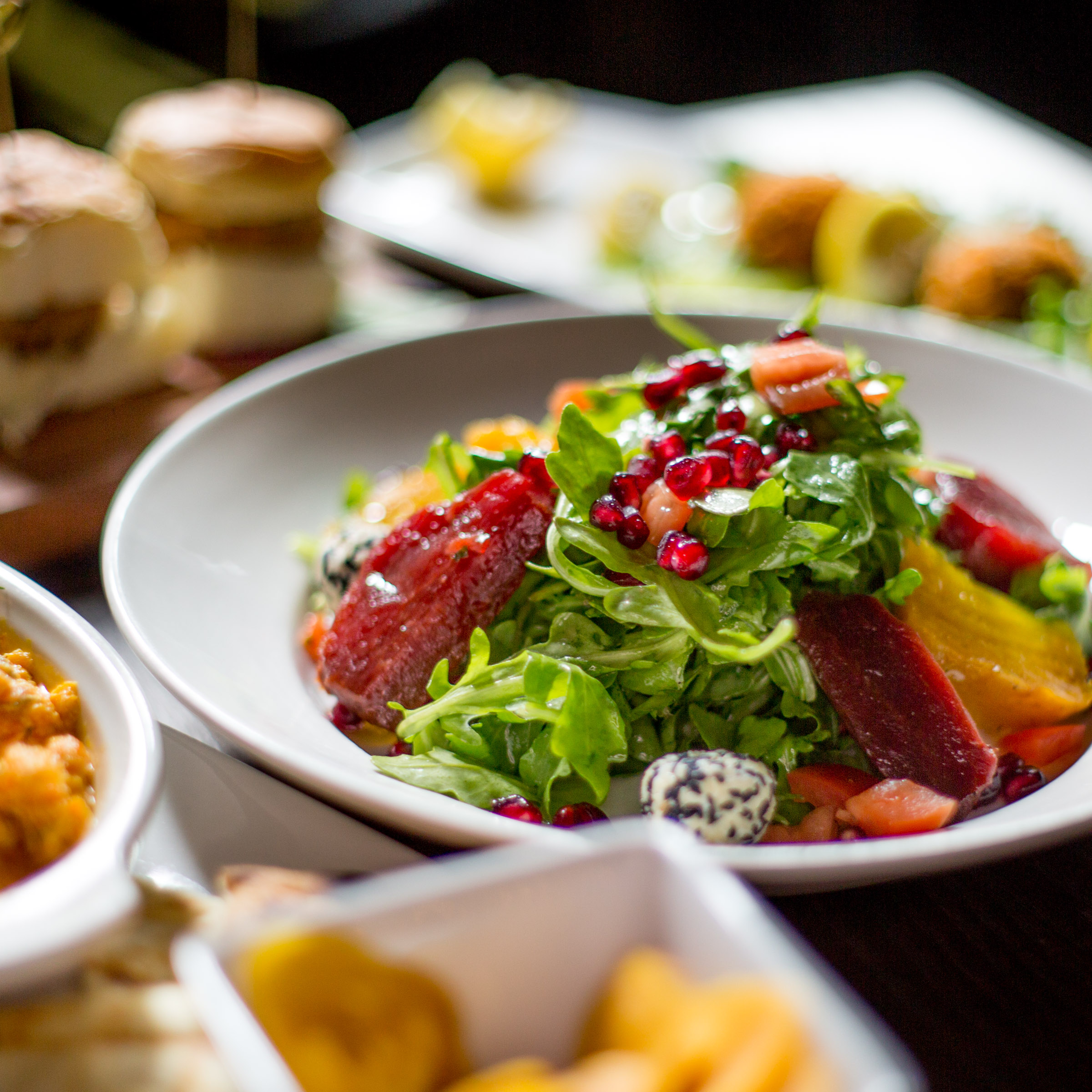 Fruit covered salad gleaming in the light of a window