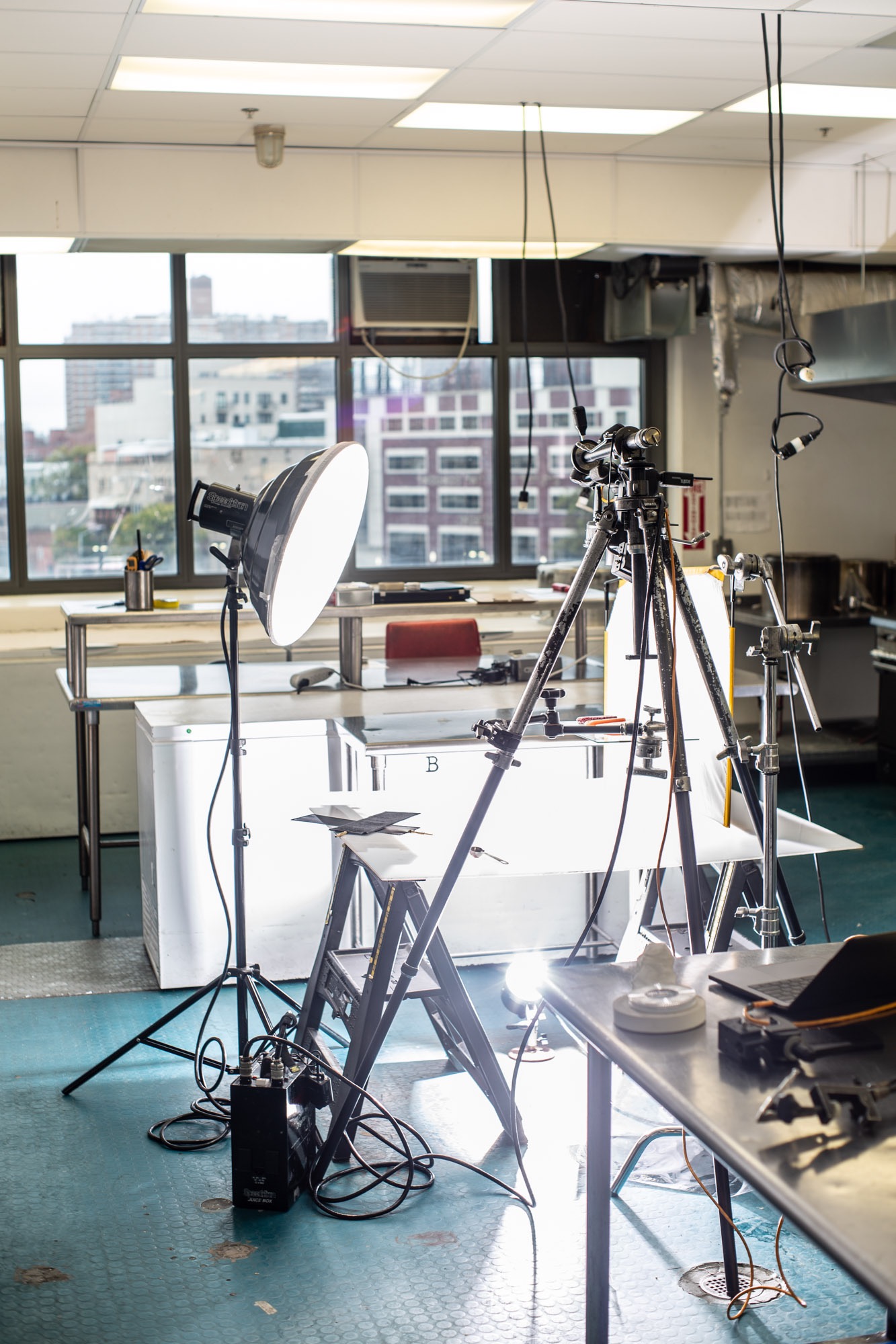 Behind the scenes of a food photography shoot in a commercial kitchen