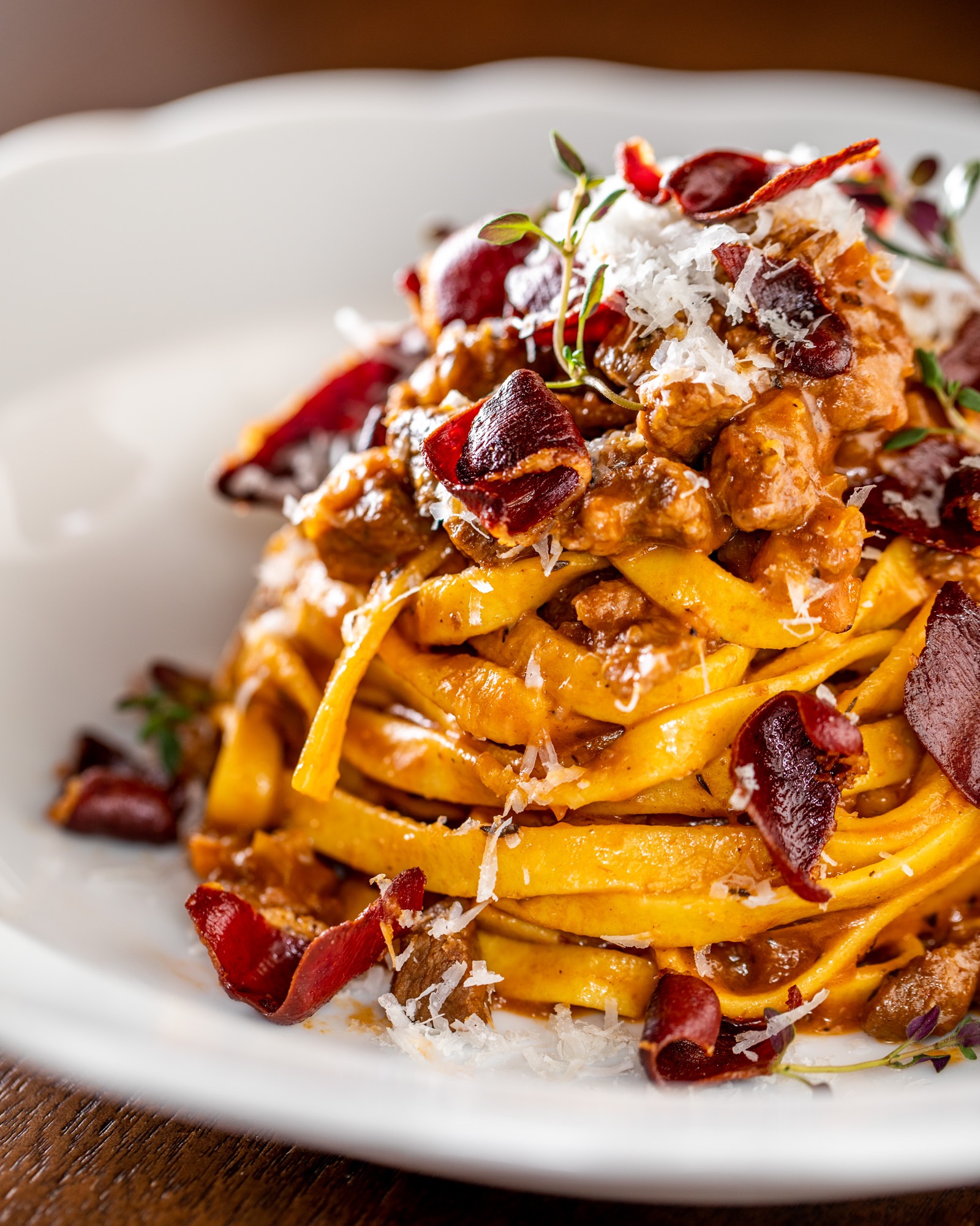 a closeup photograph of a bowl of delicious pasta