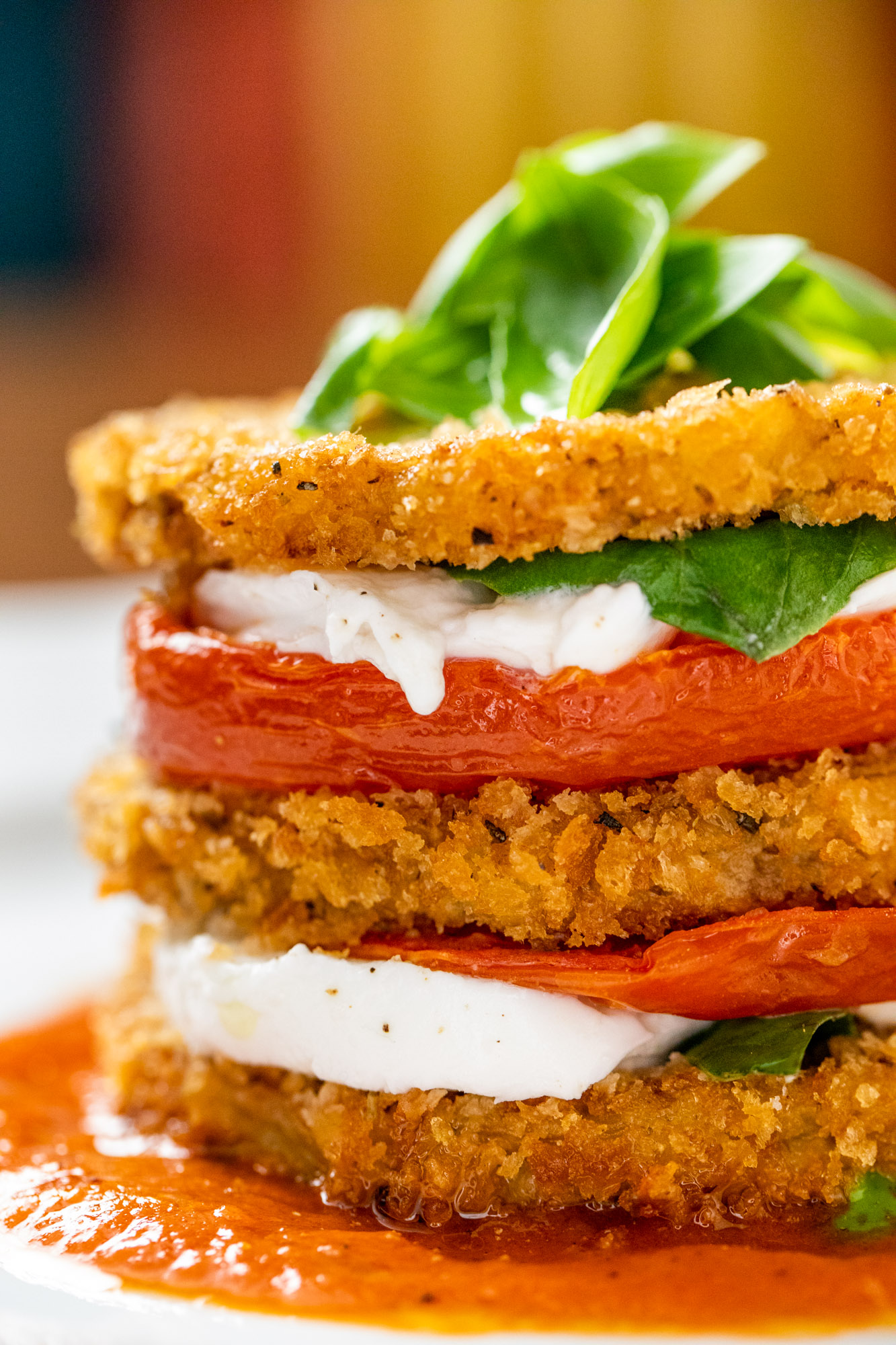 Melty cheese, tomatos and basil served at an Italian Restaurant.