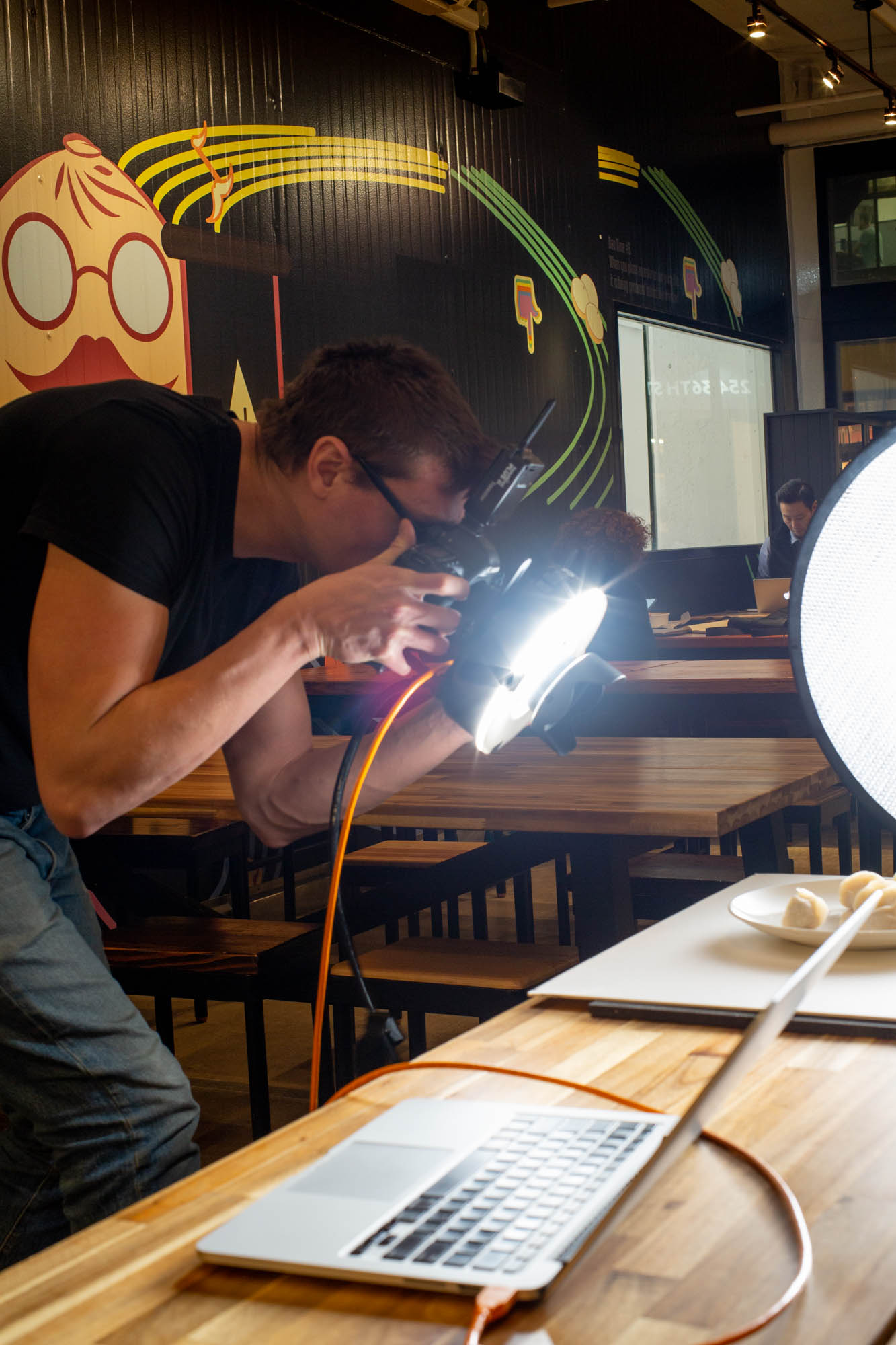 will engelmann taking photographs with a ring light