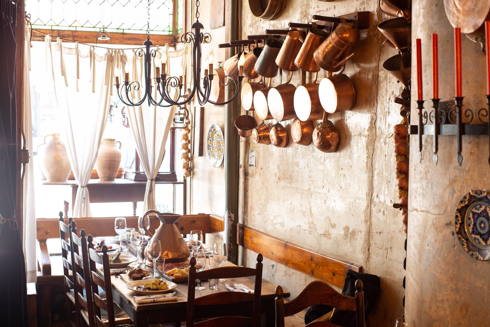 A rustic table in an Italian restaurant.